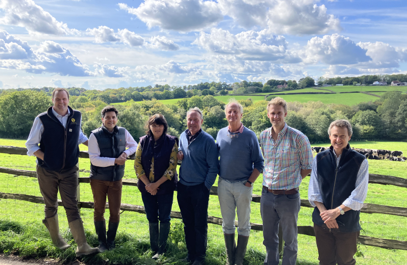 Huw on Ashburnam farm with local farmers